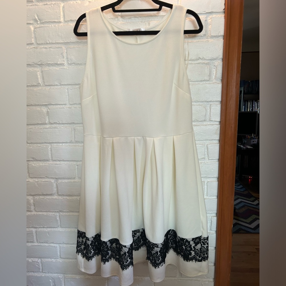 White dress with black lace detail